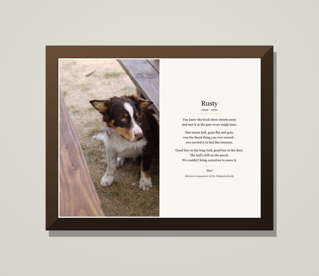 Framed memorial tribute for Rusty, an Australian shepherd, beside his poem